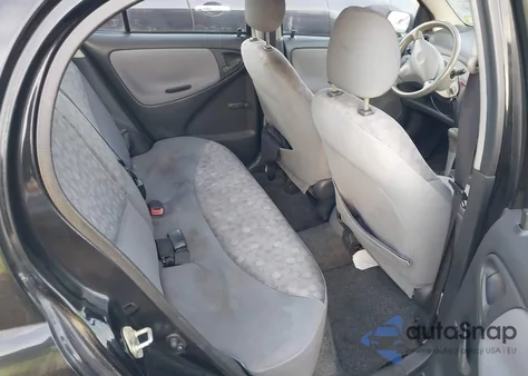 2001 Toyota Echo из США, поврежденный, VIN JTDBT123110190387